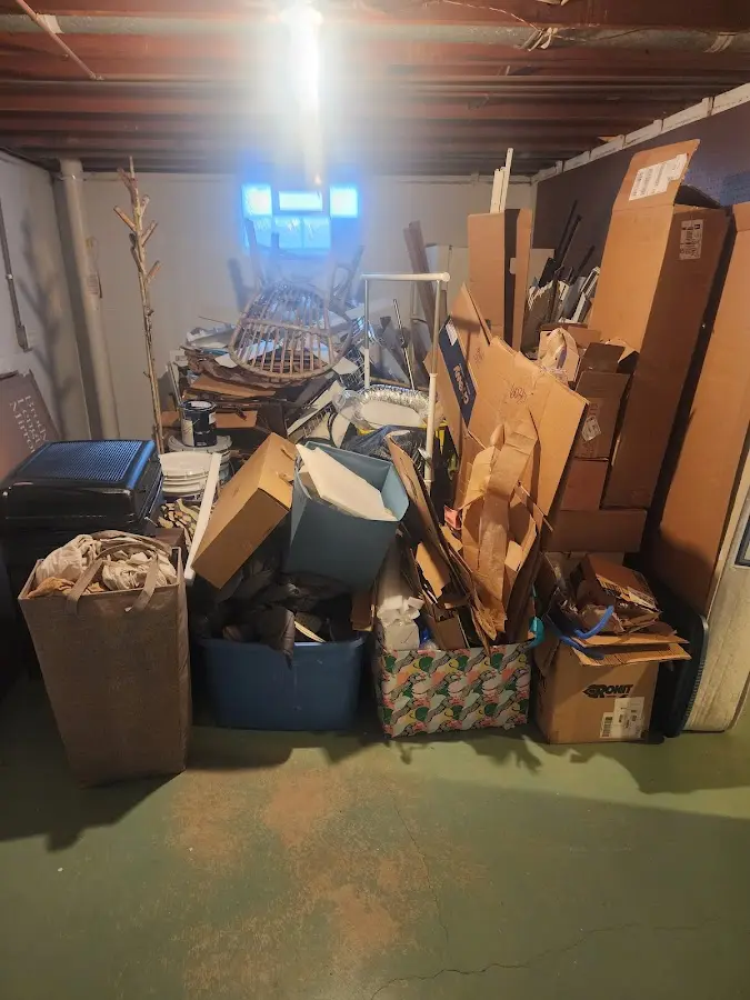 Roll-off dumpster container at job site for 6 Yard Dumpster Rental in Hayesville